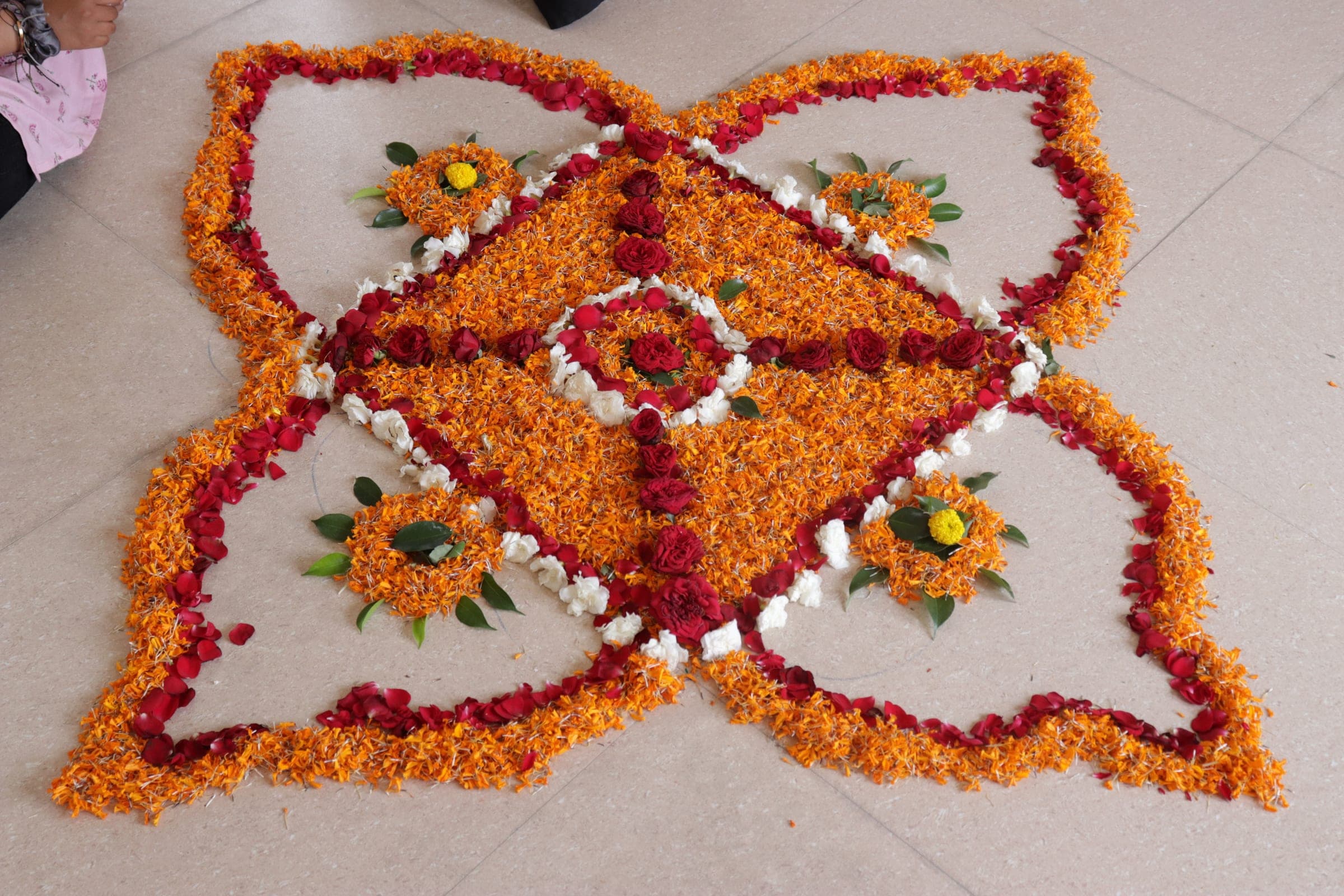 The finished flower mandala on the floor