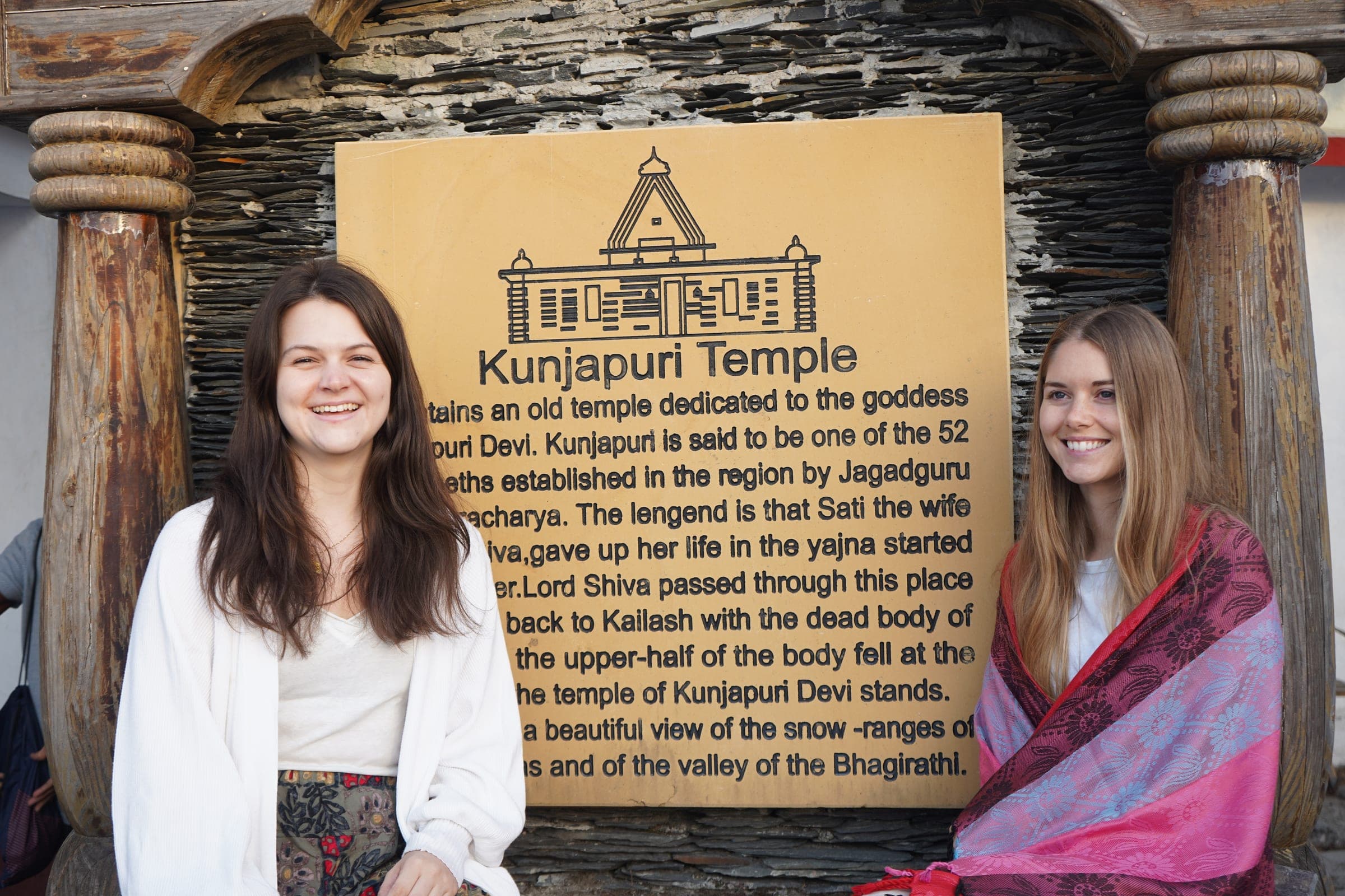 Reading the temple board at Kunjapuri
