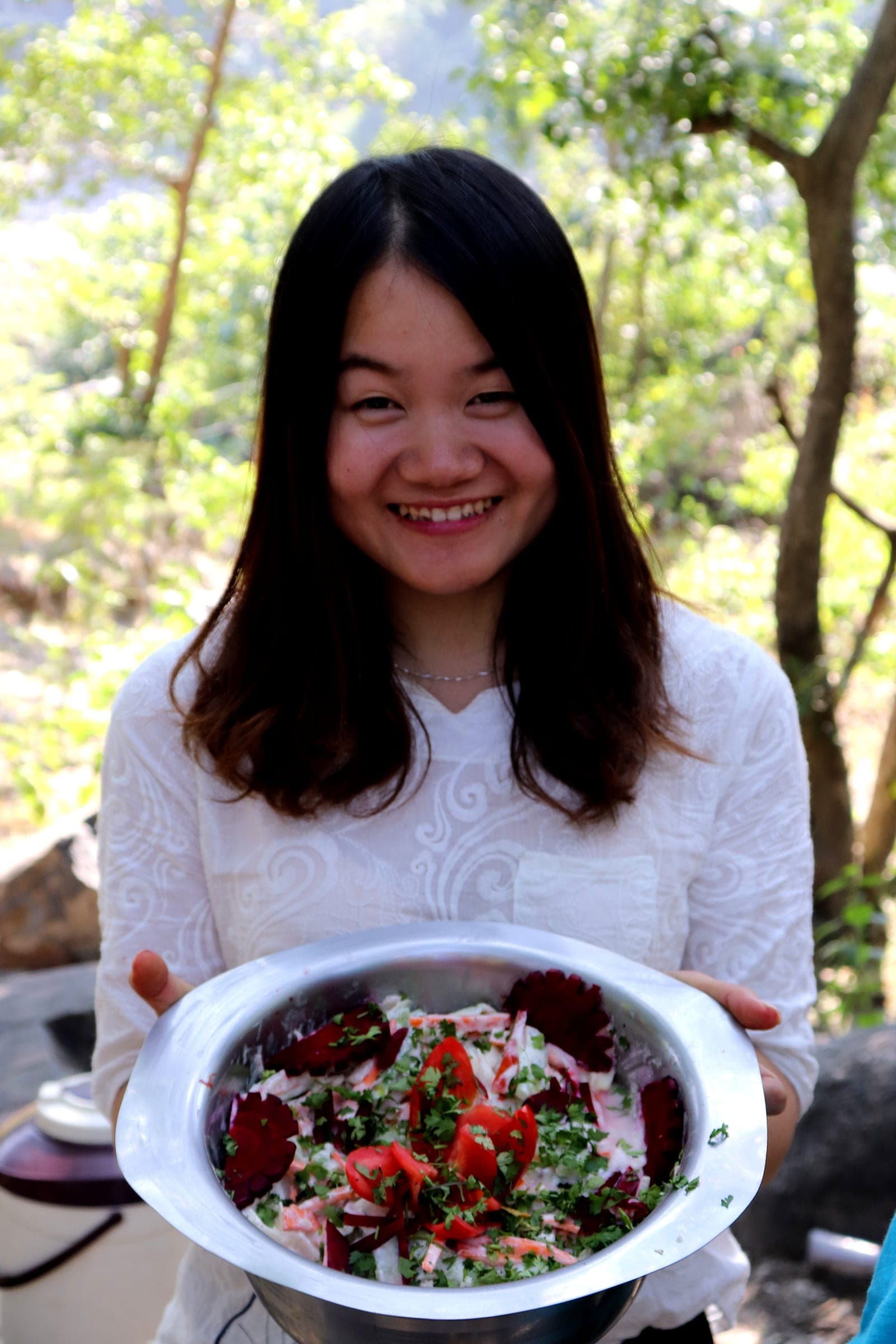 Carrying the salad round at the picnic