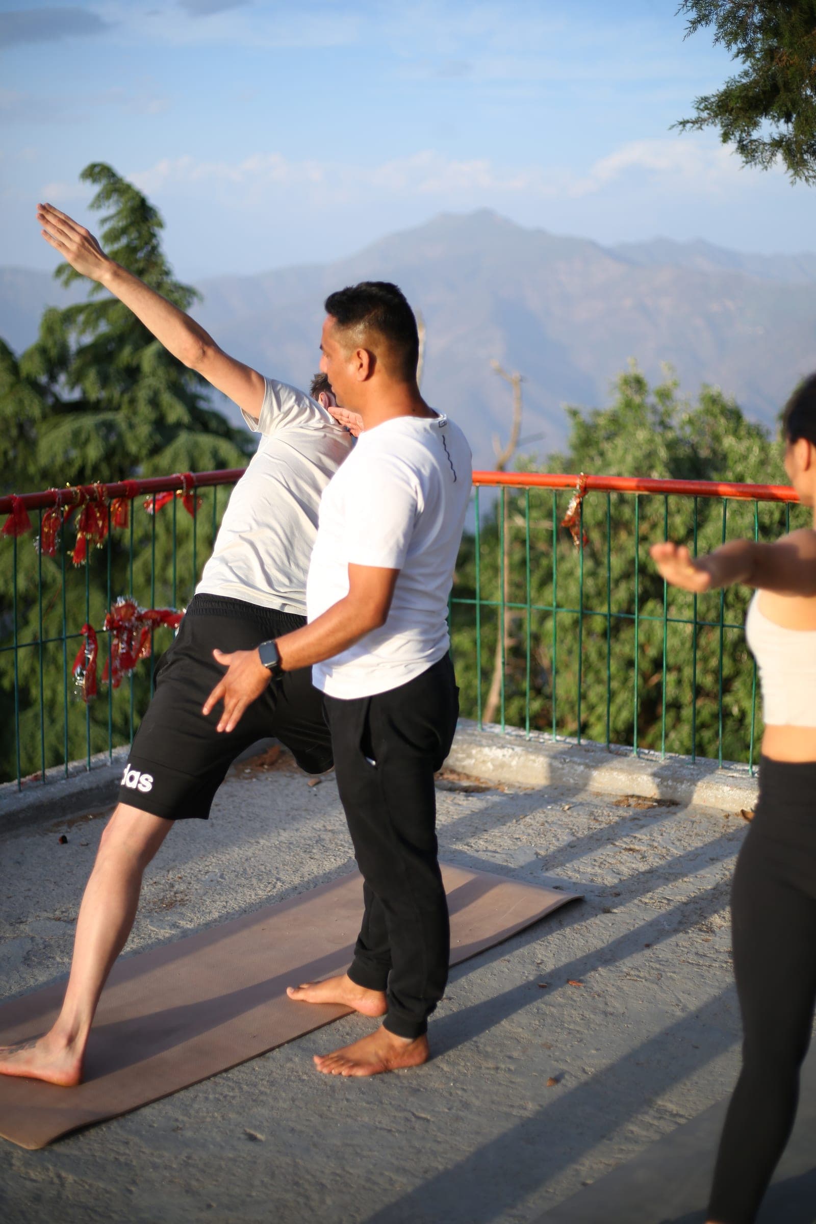 Warrior pose above the hills