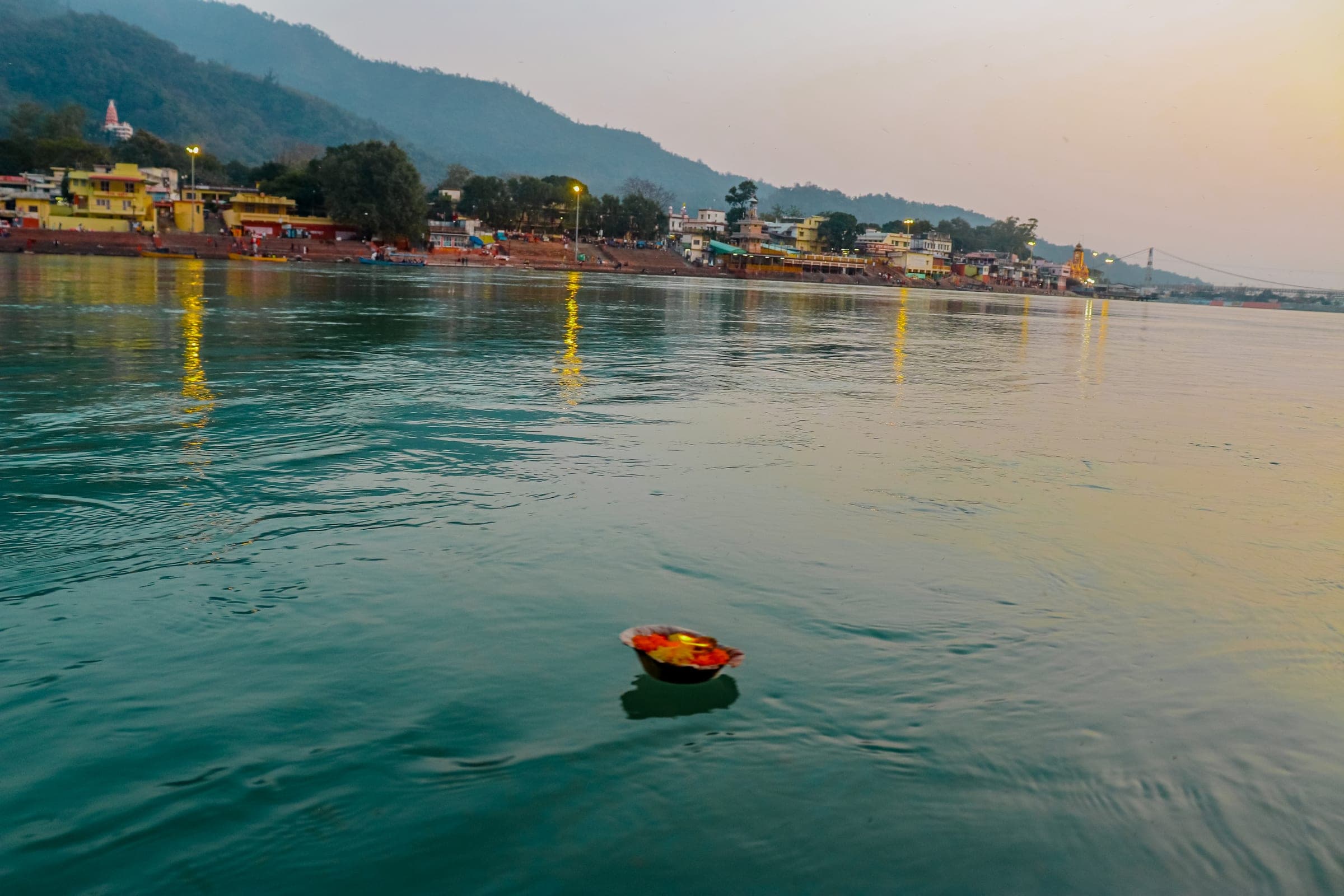 A diya set adrift on the Ganga