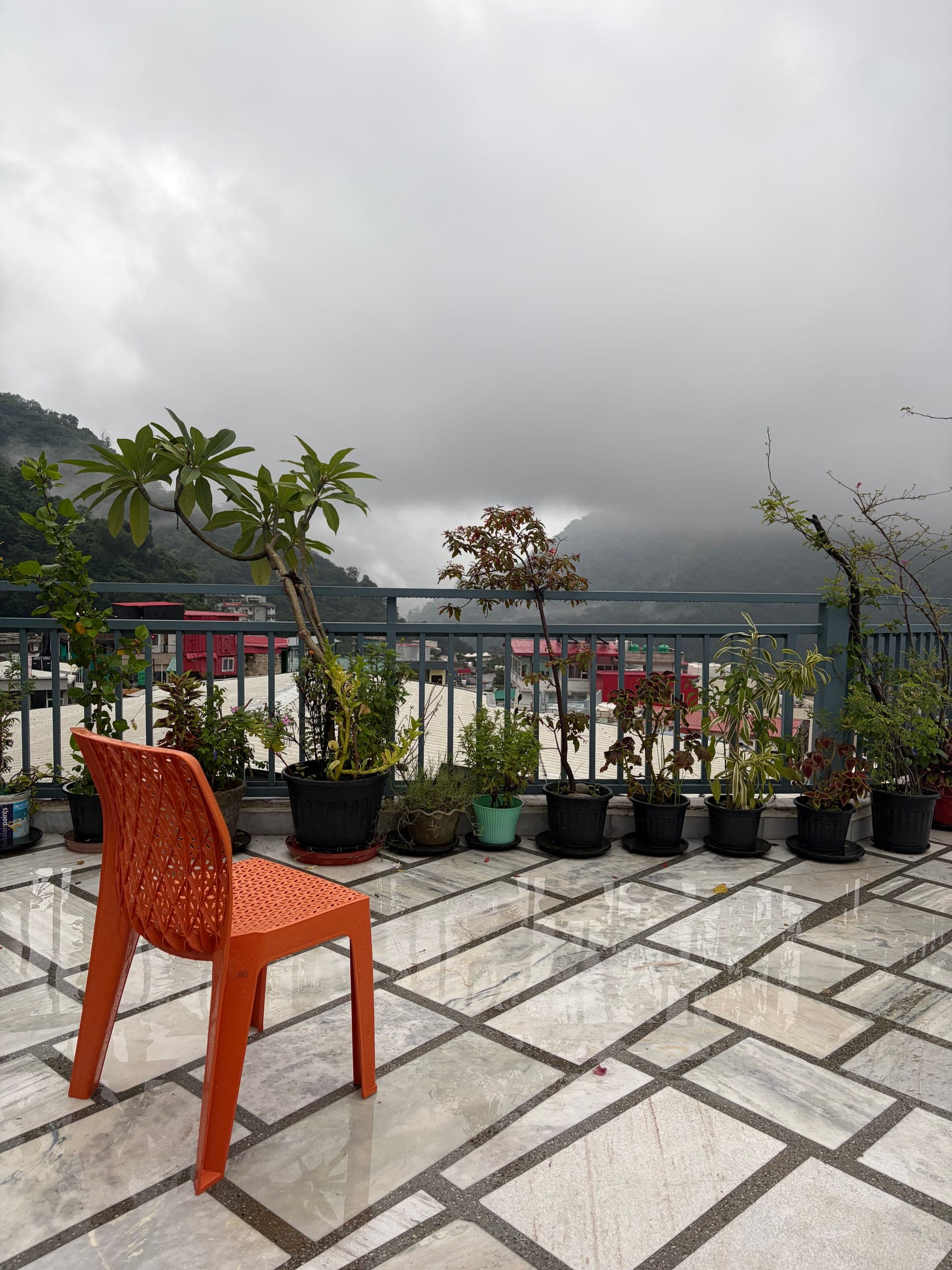Somewhere to sit out among the pots