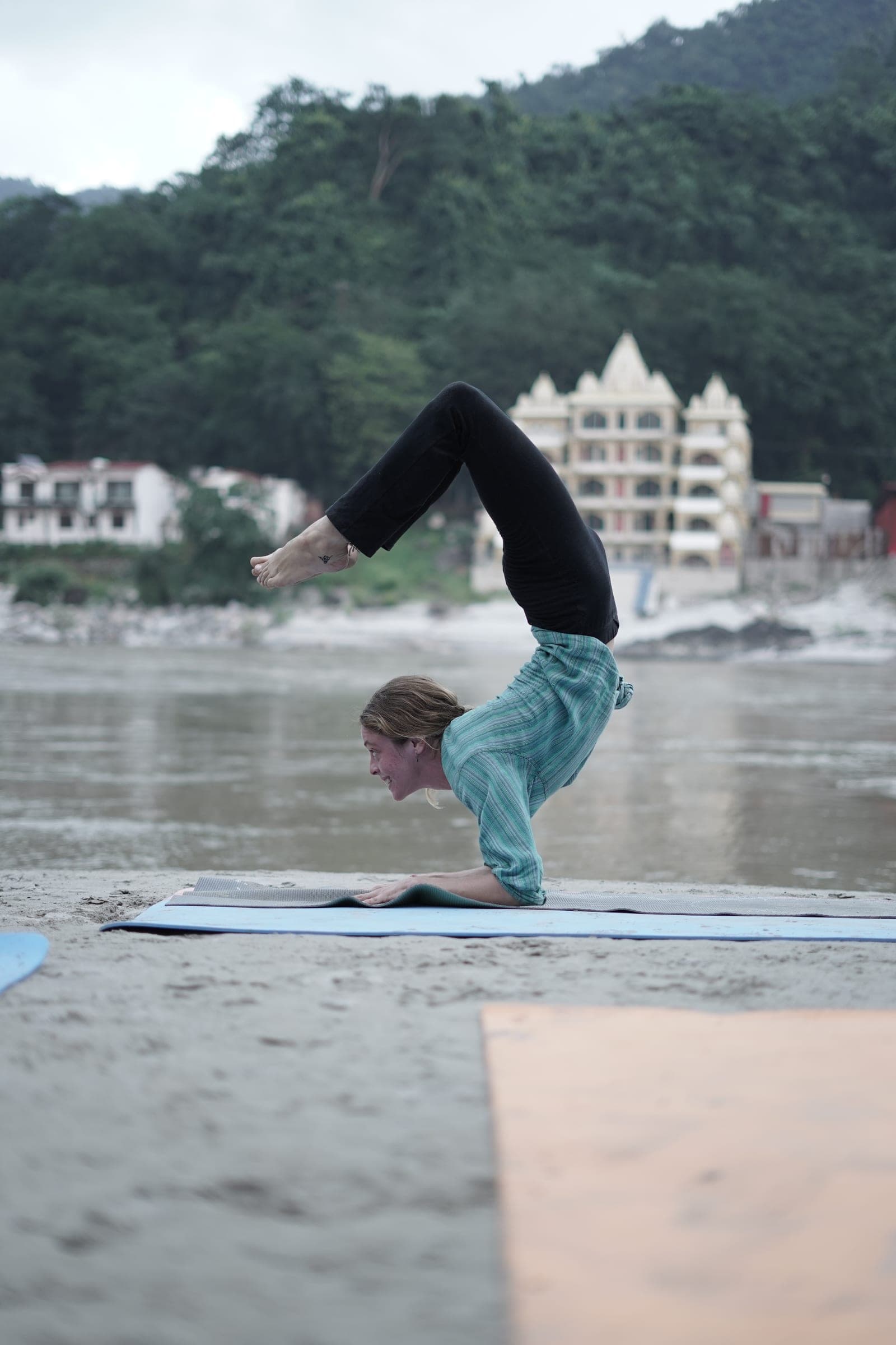 A forearm backbend on the beach