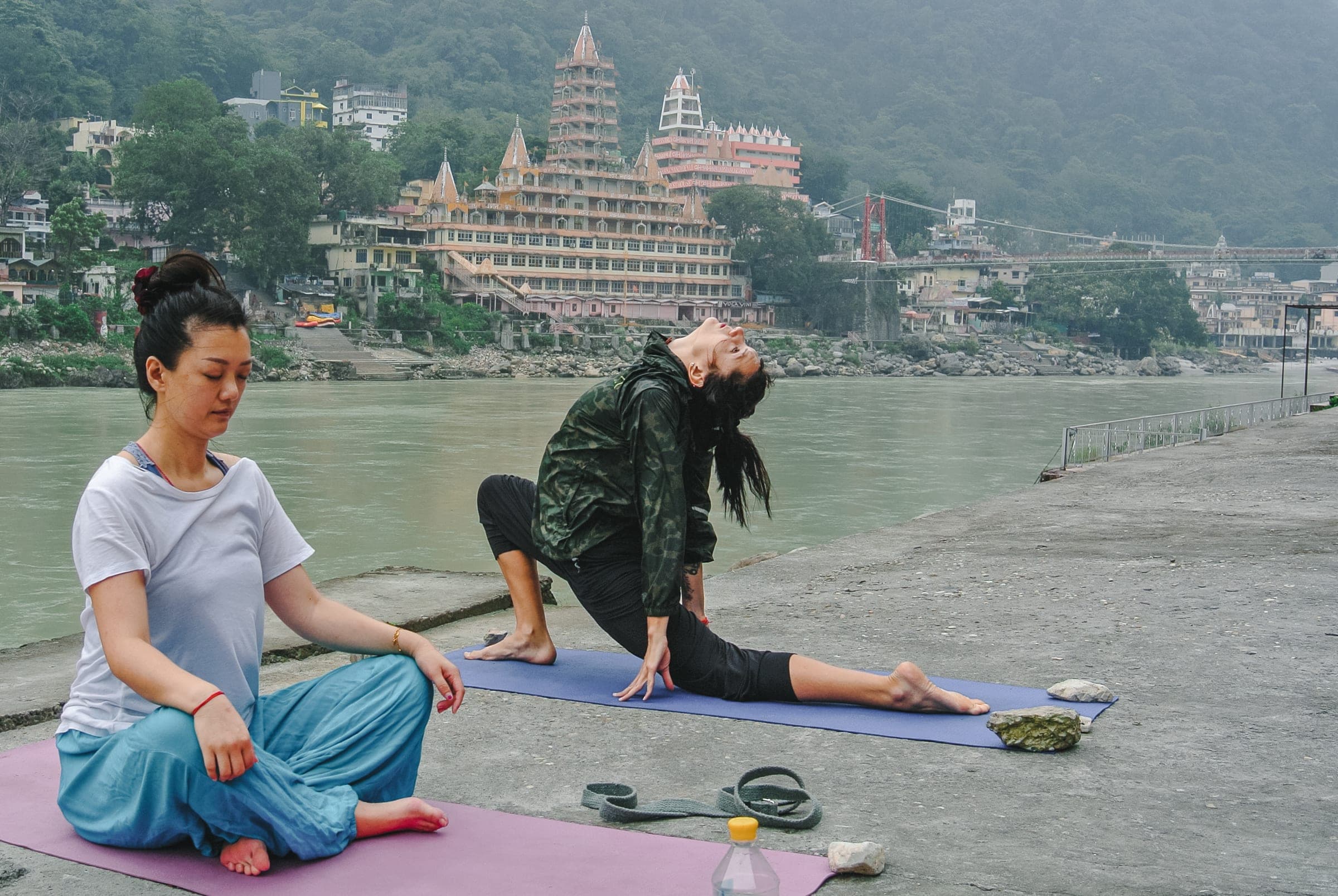 A low lunge by the water at dawn