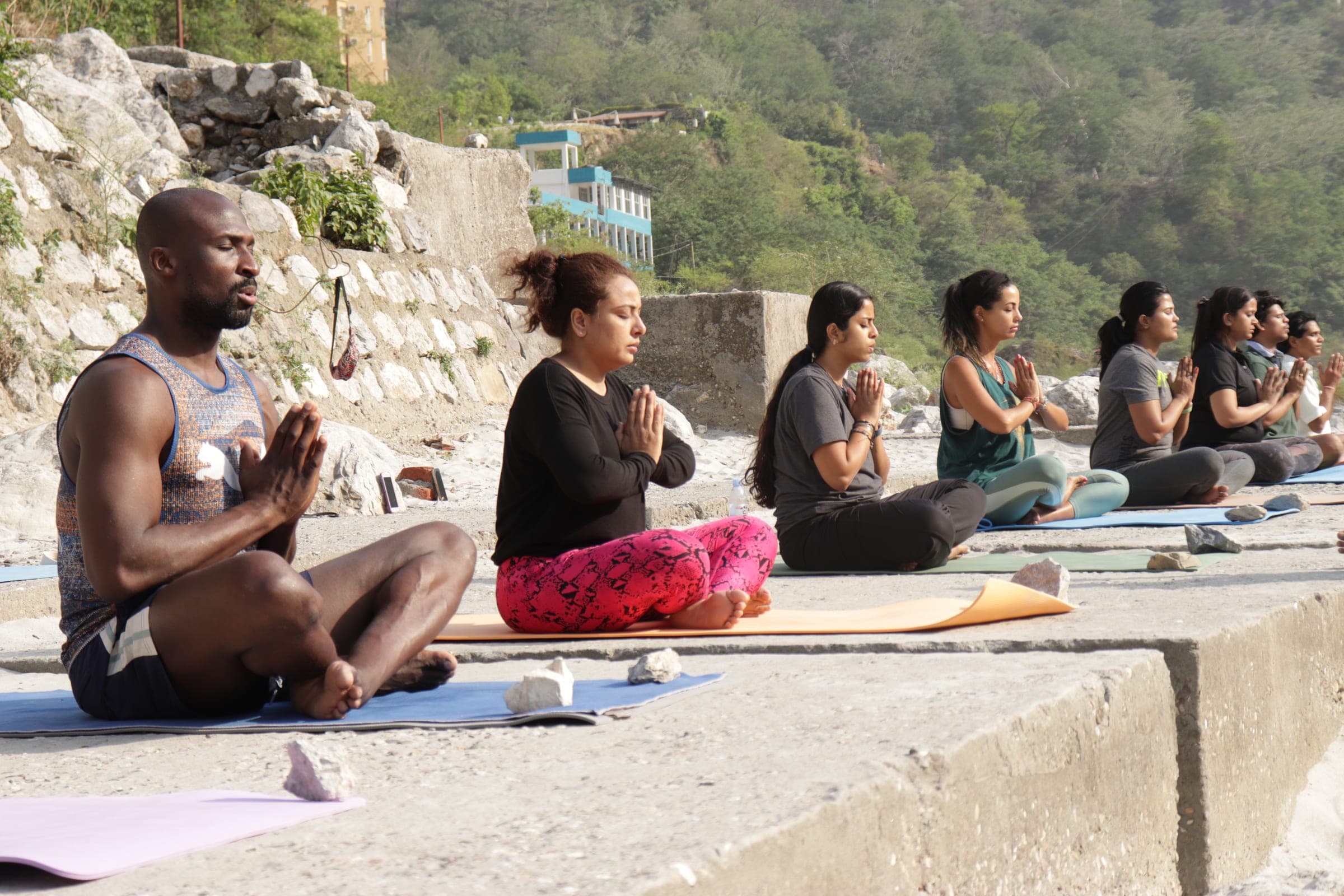 Meditation in a line along the ghat
