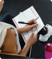 Notebook and pen for journaling in 100 hour yoga TTC Rishikesh